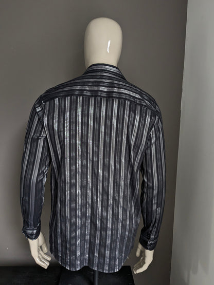 Vintage Roger has a shirt. Black / silver striped. Size L.