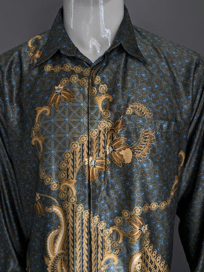 Chemise batik Queen Busana. Légèrement doublé. Impression de colorant Blue Black Gold. Taille xl.