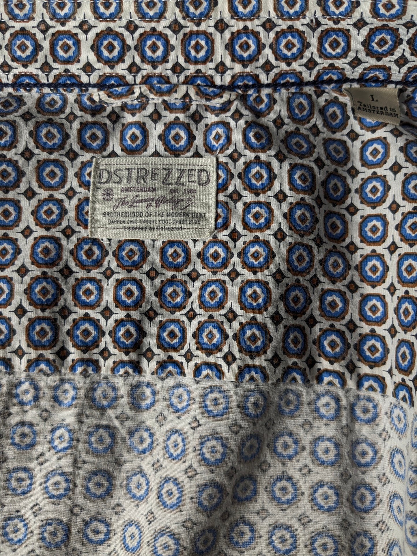 Dstrezzed shirt. Blue brown print. Size L. Stretch.