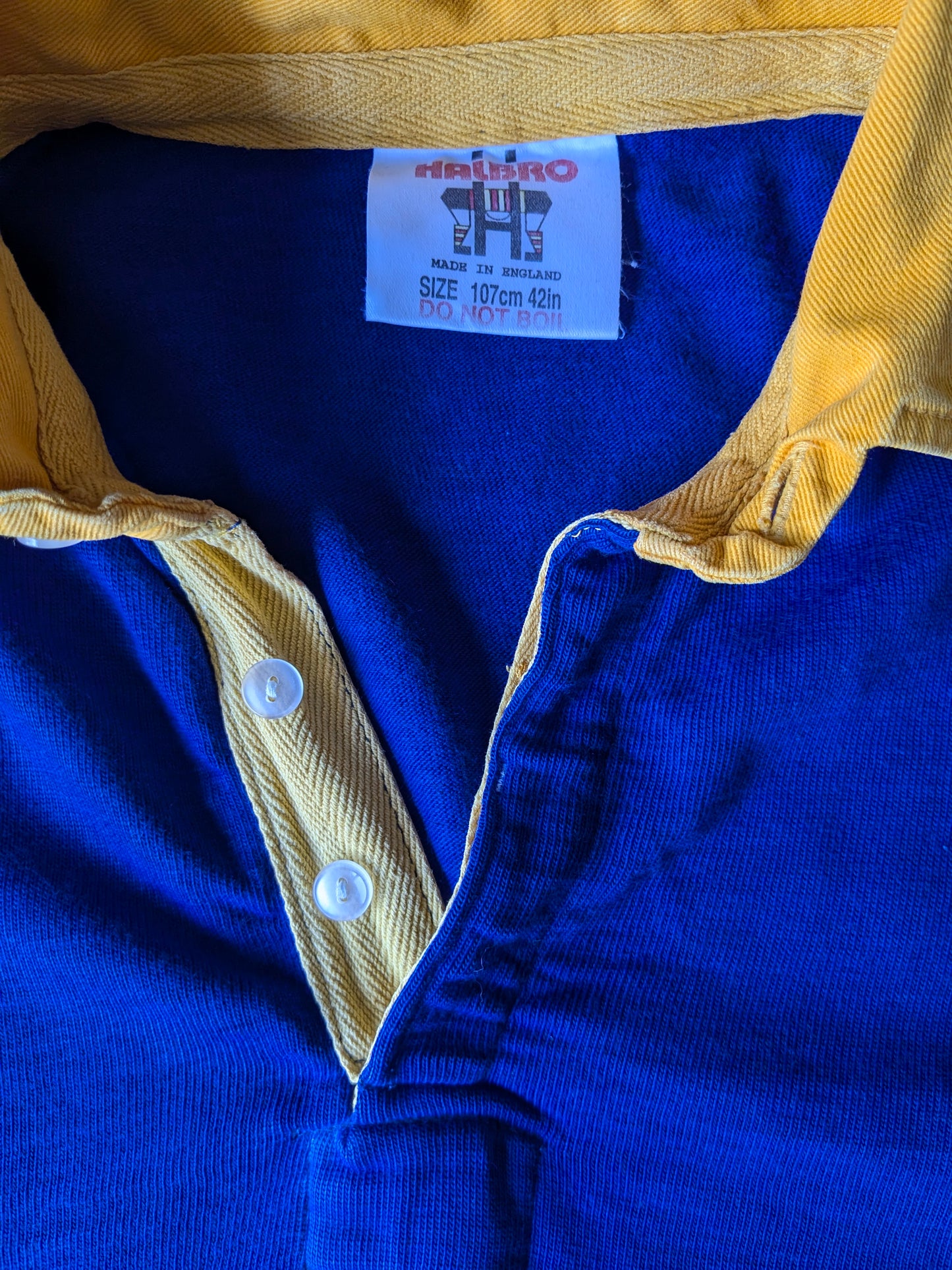 Pull Polo Halbro Vintage. Bleu jaune noir rayé. Taille L.