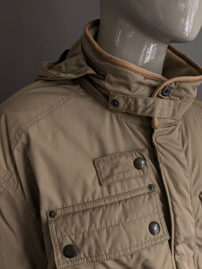 Polo Ralph Lauren Winter jacket. Beige colored. Double closure and hidden hood. Size 3XLB BIG.