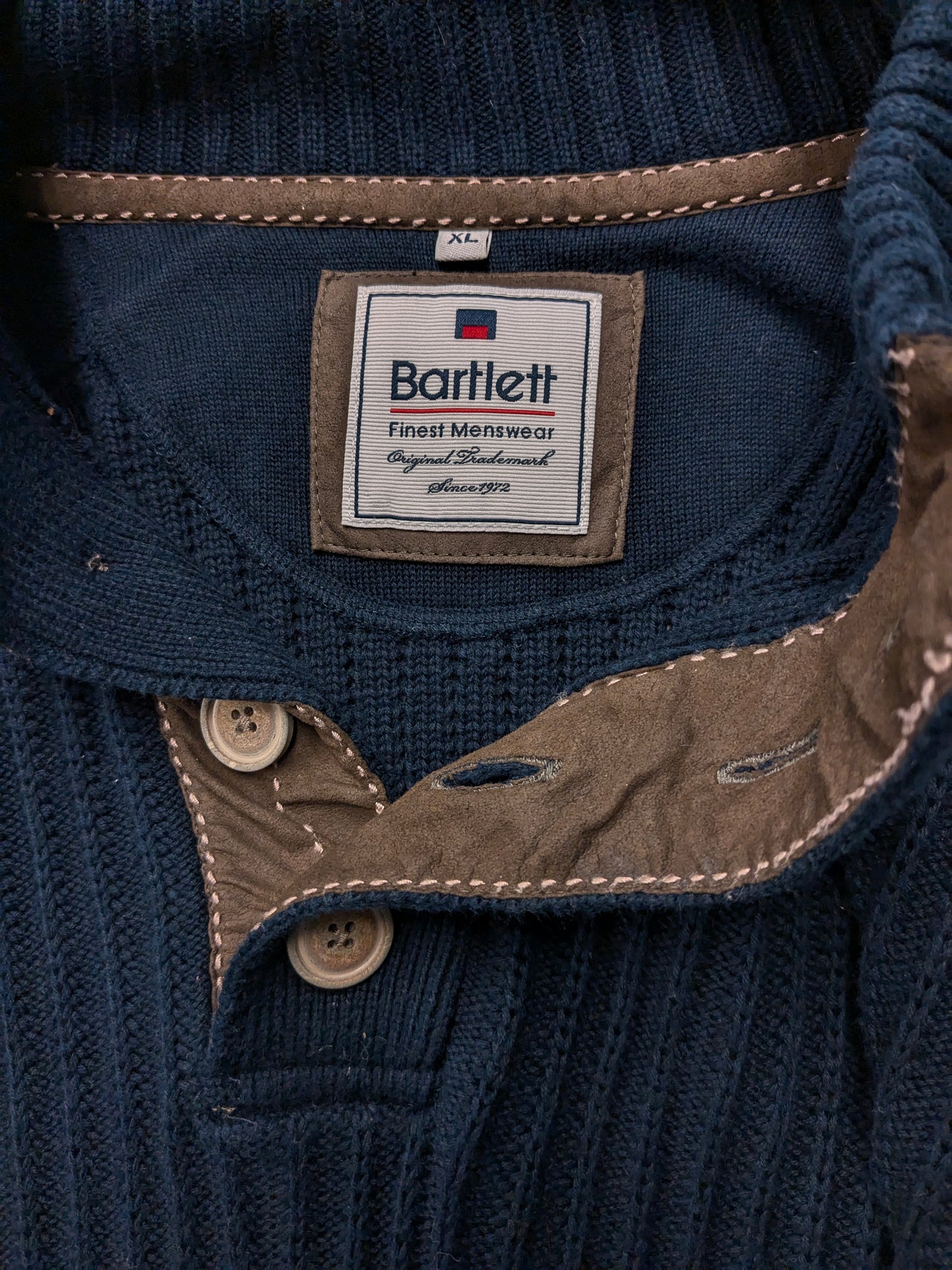 Bartlett sweater with elbow patches and buttons. Dark blue colored. Size XL.