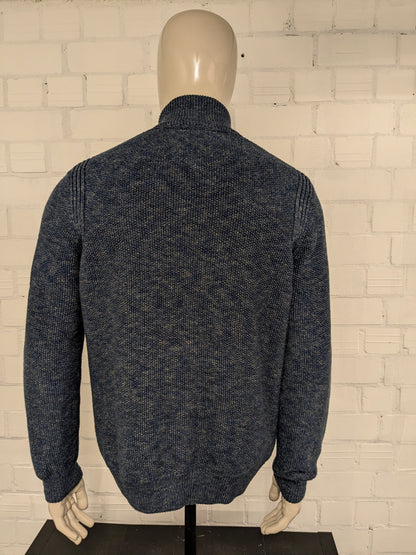 Cardigan Lerros avec fermeture éclair et boutons. Vert bleu mélangé. Taille M.