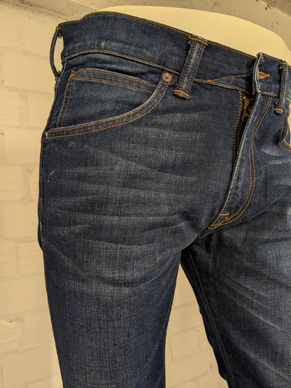 Edwin jeans. Donker Blauw gekleurd. Maat W31 - L34. Slim Tappered. Low Crotch.