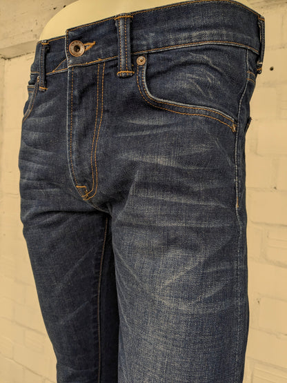 Edwin jeans. Donker Blauw gekleurd. Maat W31 - L34. Slim Tappered. Low Crotch.