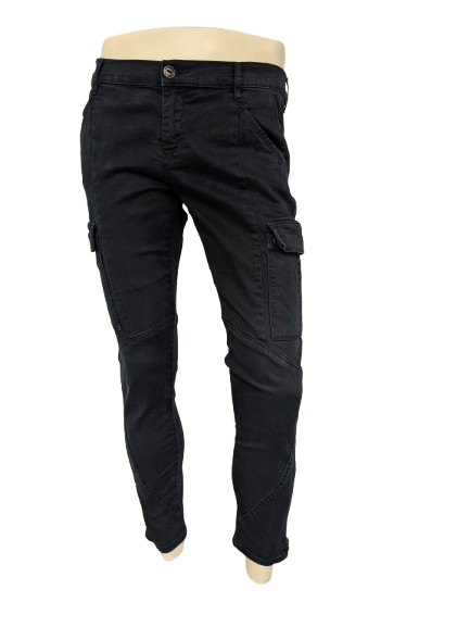 Tommy Denim cargo broek. Donker Blauw gekleurd met ritsen einde broekspijp. Maat W33 - L28. stretch.