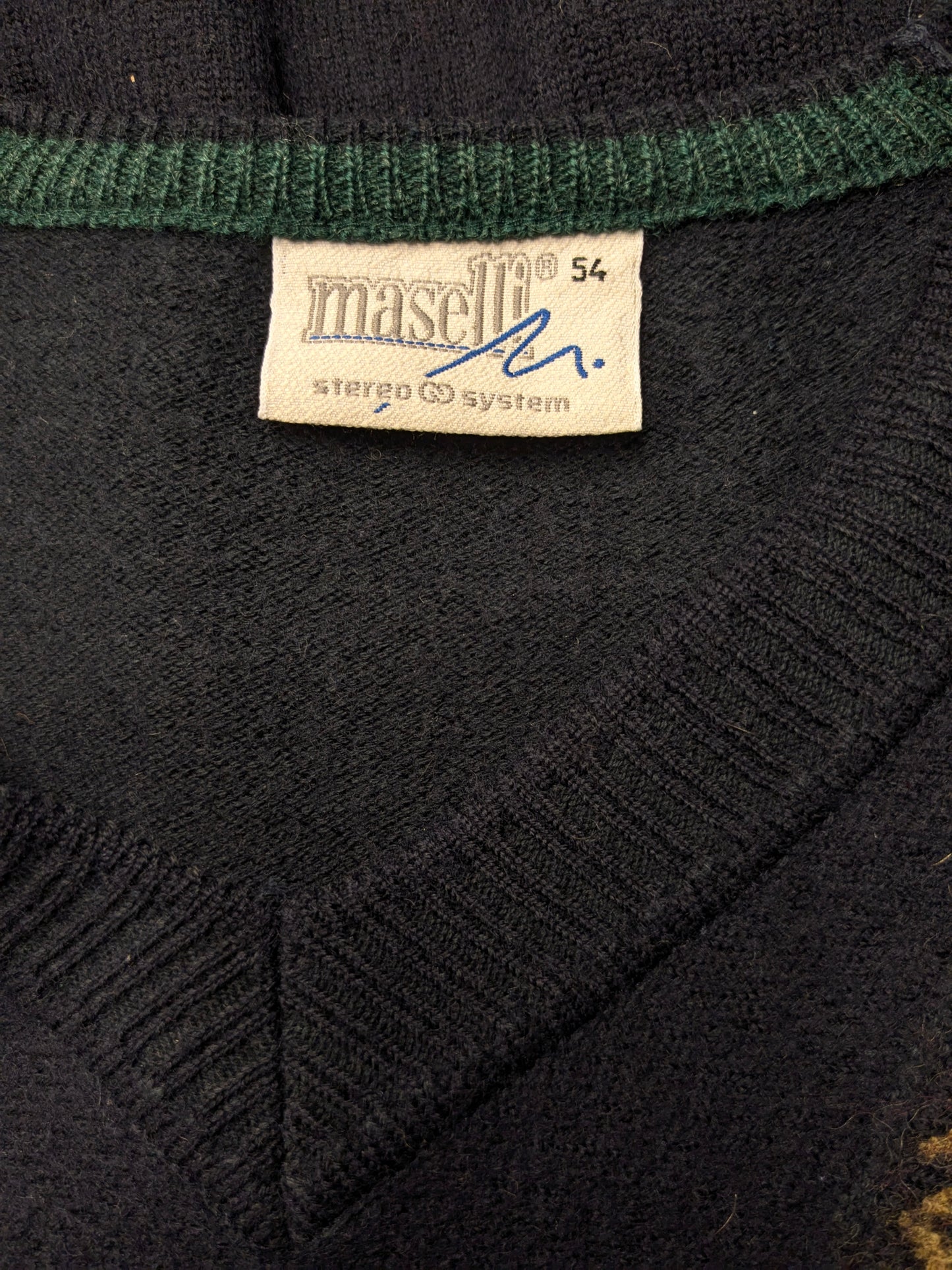 Vintage Maselli Wollen trui met V-Hals. Donker Blauw met gekleurde accenten. Maat L.