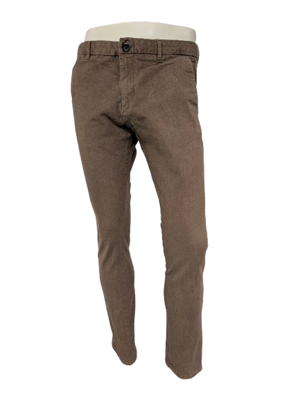 WE Fashion broek. Bruin visgraat motief. Maat W33 - L34.