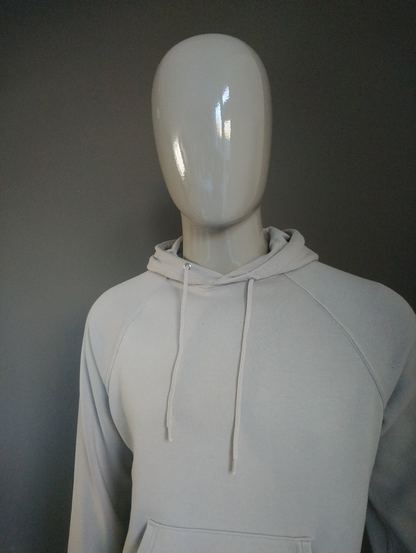 H&M Divided Hoodie. Beige gekleurd. Maat XS.