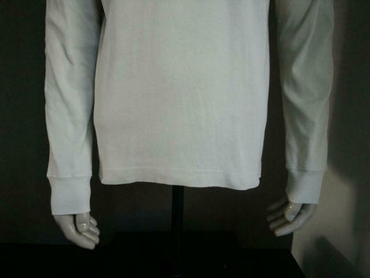 Silvercreek Longsleeve. Beige con impresión. Tamaño M / L, es espacioso