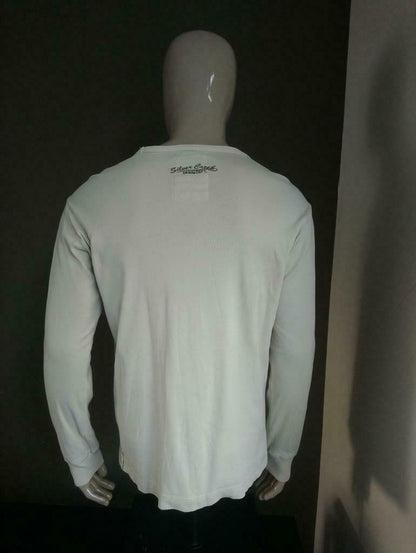 Silvercreek Longsleeve. Beige avec impression. Taille m / l, est spacieuse