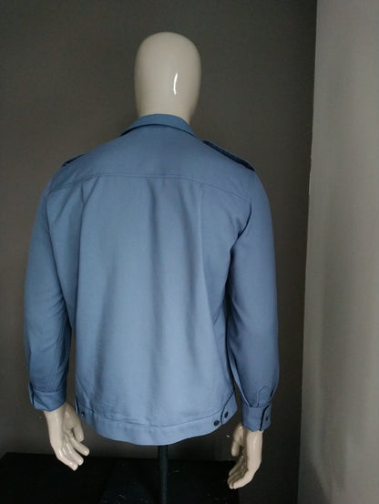 Vintage 70's overhemd met puntkraag. Blauw gekleurd. Maat L.