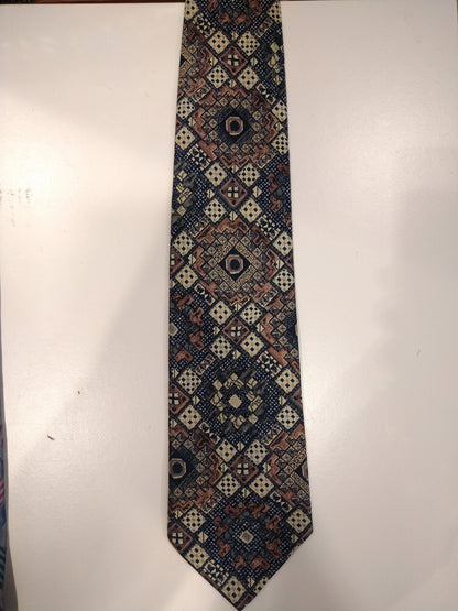 Tie en polyester Claudy vintage. Beau motif vintage.