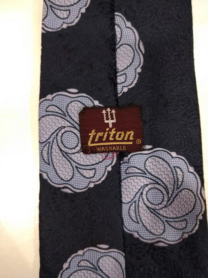 Cravatta in poliestere Triton vintage. Bel motivo vintage blu / azzurro.