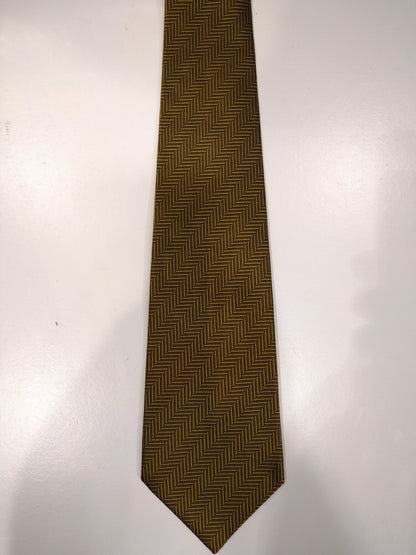 Salvatore Ferragamo silk tie. Yellow / gold motif