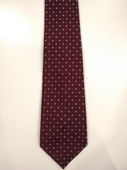 Tie en polyester St. Michael. Motif de boules gris rouges.