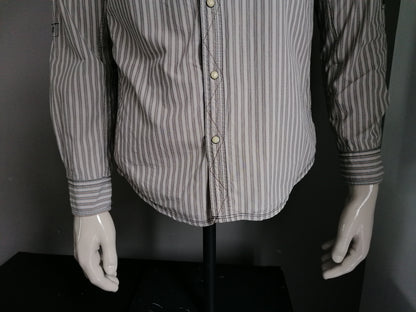 Kaporal shirt with press studs. Brown striped with applications. Size M / S