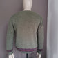 Vintage Wollen trui met V-hals. Groen gekleurd. Maat XL.