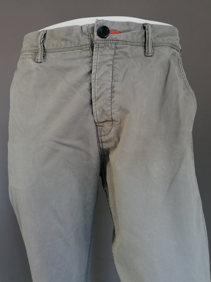 Superdry Broek / Chino. Beige gekleurd. Maaat 56 / XL. Type Rookie Chino.