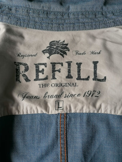 Rempille jeans / chemise en jean avec goujons de presse. Couleur bleue. Taille L.