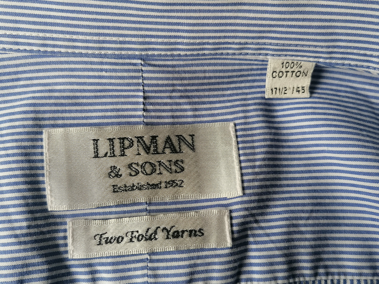 Chemise Lipman & Sons. Bleu blanc rayé. Taille 45 / xxl / 2xl. Type de nœuds de manchette