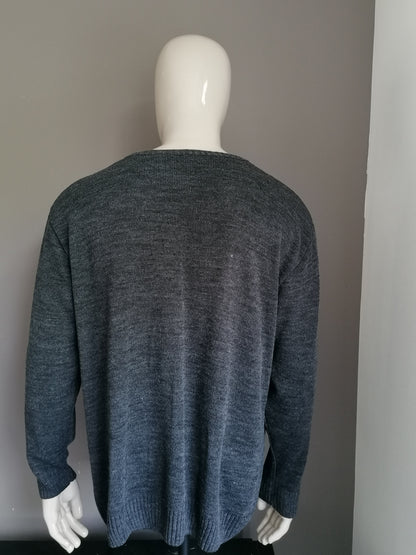 Vintage -Pullover. V-Ausschnitt. Graues weißes Motiv. Größe xxl / 2xl.