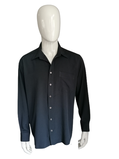 Chemise Canda vintage. Couleur noire. Taille xl xxl. 65 de viscose et 35 de polyester. EcoGents