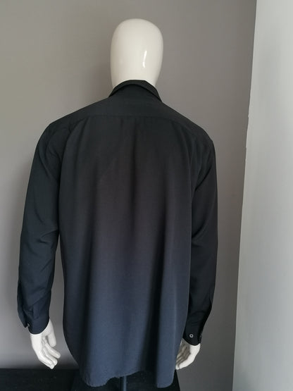 Vintage CANDA overhemd. Zwart gekleurd. Maat XL / XXL. 65% Viscose & 35% Polyester.