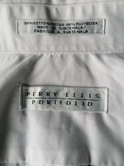 Chemise Perry Ellis. Blanc. Taille 42 / L. 65% de coton et 35% de polyester.