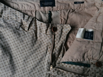 Scotch & Soda Broek. Impression gris brun beige. Taille W31 - L30. Type Stuart. Soigneusement raccourci.