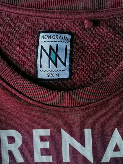 Nicht -Grada -Pullover. Rot gemischt mit Druck. Größe M.