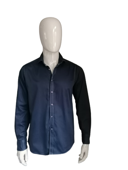 Chemise évidente. Couleur bleu foncé. Taille 41 / L.