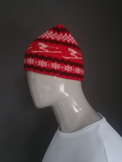 Vintage woolen hat. Red beige black ski print.