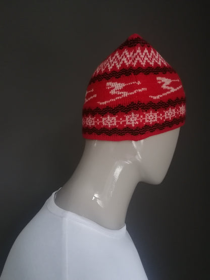 Vintage woolen hat. Red beige black ski print.