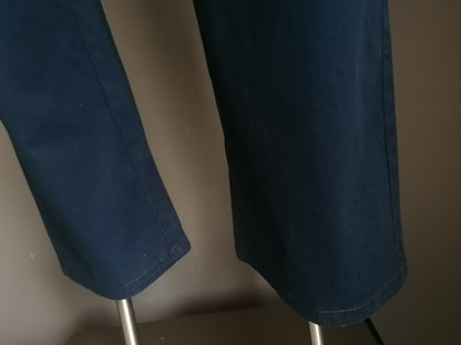 st. Bernards pants / trousers. Dark blue colored. Size 42 / S.