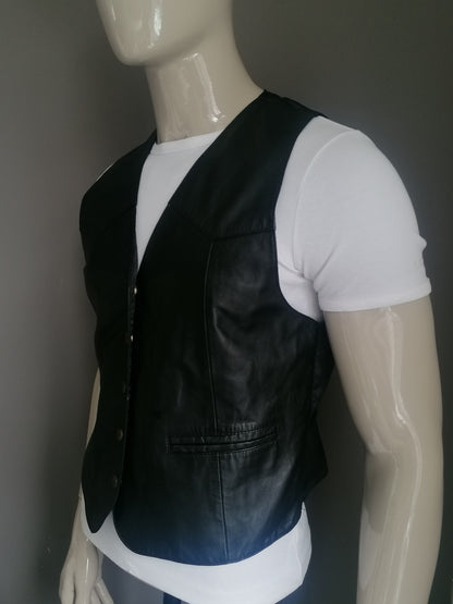 Gilet en cuir Studio Fashion avec goujons de presse. Couleur noire. Taille M.