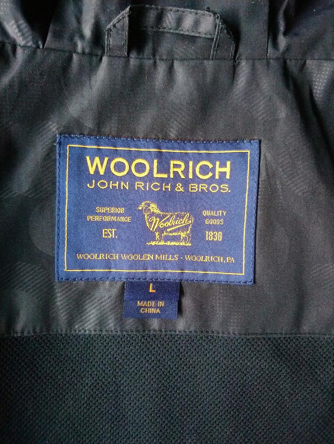 Taglia woolrich 2024